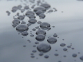 ハイブリッドナノガラスの硬化系ガラスコーティング「開発コード：MG-01070」の超撥水被膜ではじかれた水滴